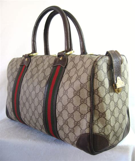 vintage gucci web duffle|genuine Gucci duffle bags.